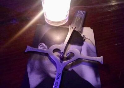a healing cross and candle at Derricks night