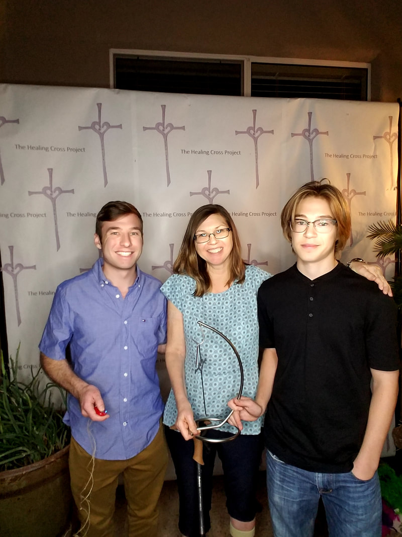 Suzy Korinko and her sons. Suzy was the Healing Cross recipient for our 2018 Derrick's Night